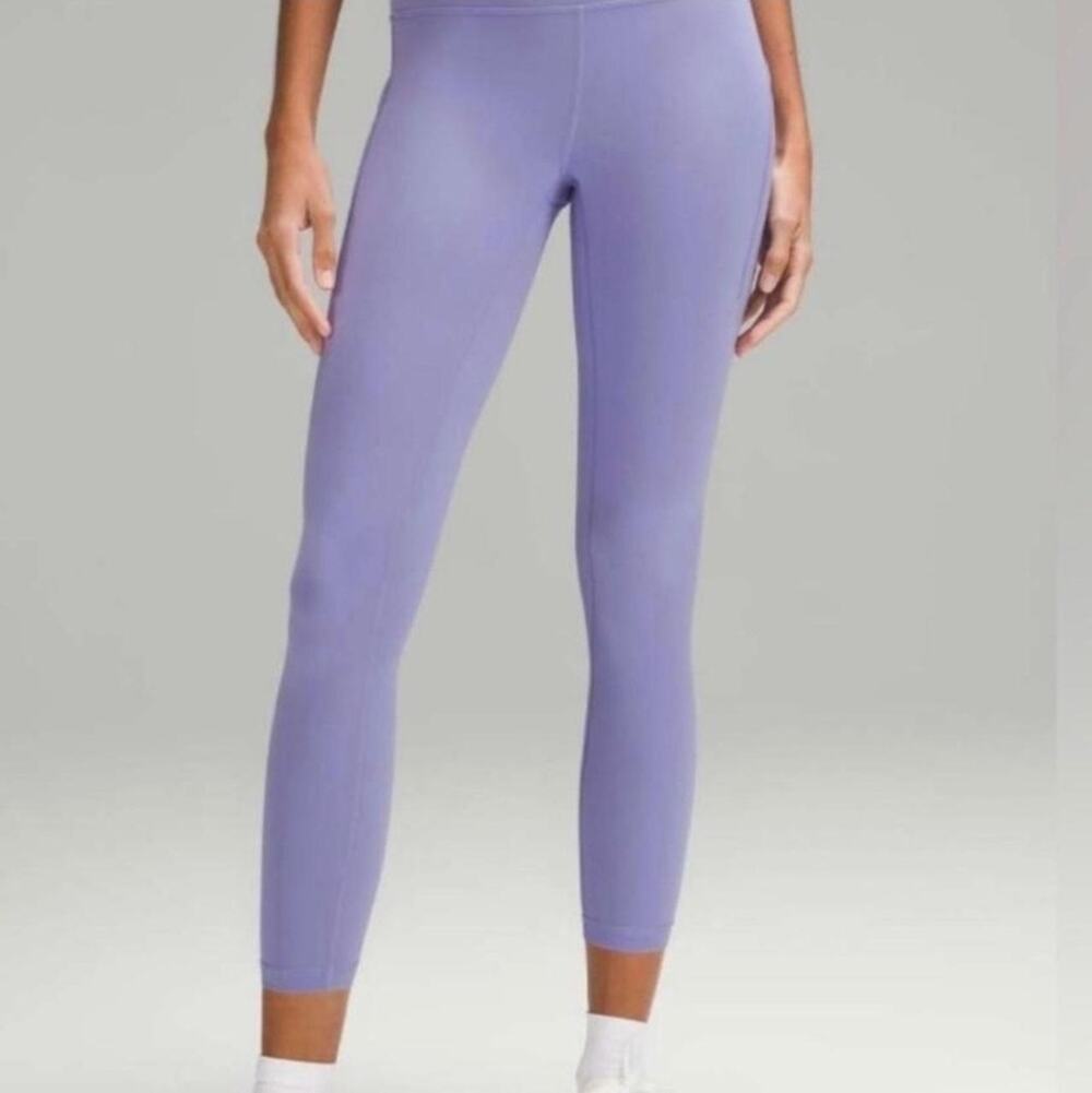 Lululemon athletic leggings with functional side drop-in pockets